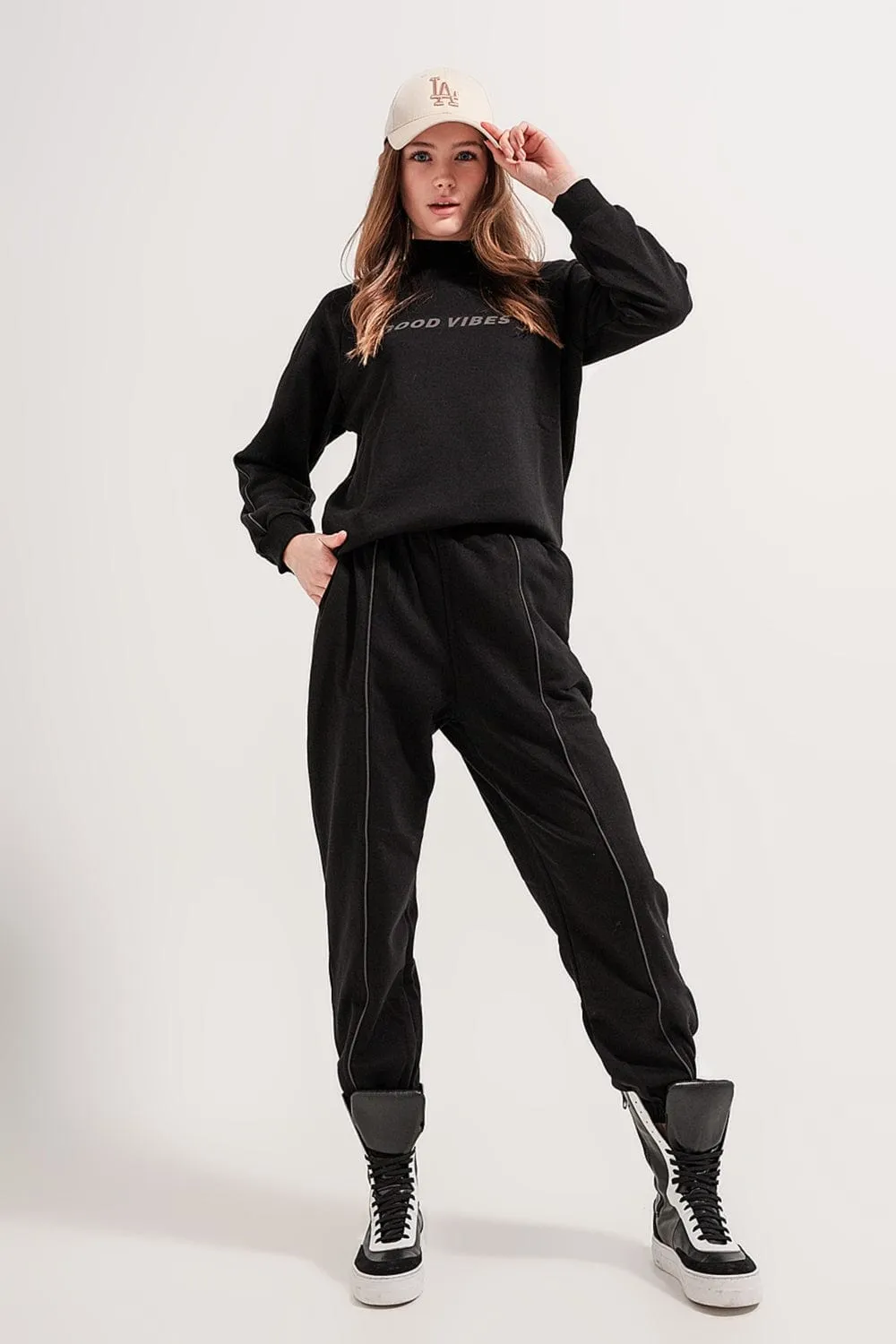 Joggers With Drawstring Waist And Front Seam In Black